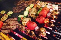 In der Cosina (argentinische Küche) sind die Parilleros (Köche) Meister in der Zubereitung von Fleisch auf der Parillada (Holzkohlengrill) in Amsterdam Holland Niederlande
